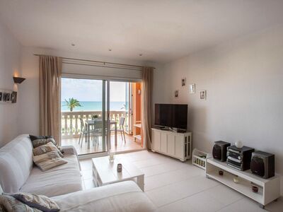Ruim appartement, direct aan de zee, met parkeerplaats en berging