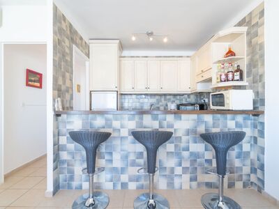 Appartement met zicht op haven, groot terras